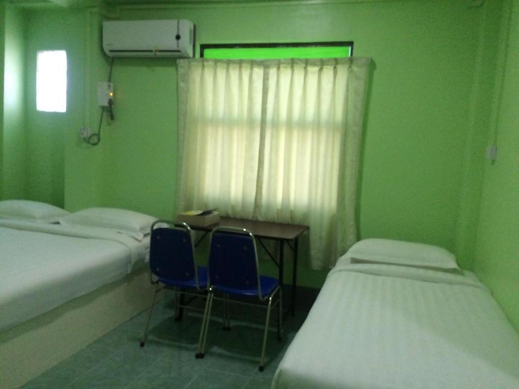 Nay Chi Lin Hotel Pathein Buitenkant foto